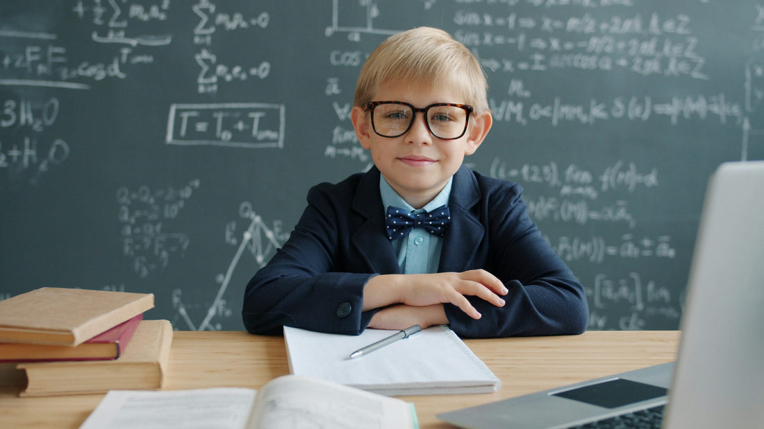 Student at a desk studying with math notes and exam materials